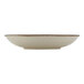 A white plate with a brown rim.