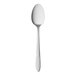 A long stainless steel spoon with a white handle.