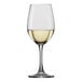 A Spiegelau white wine glass filled with white wine.