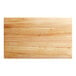 A Choice wooden cutting board with rounded edges.