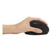 A left hand holding a black Kensington Pro Fit ergonomic wireless mouse.