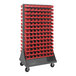 A Quantum mobile steel rack with red bins on both sides.