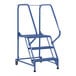 A blue metal ladder with perforated steps and metal handrails.