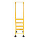 A yellow Vestil commercial rolling step ladder with four perforated steps and wheels.