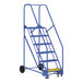 A blue steel rolling warehouse ladder with wheels.