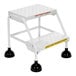 A white Vestil commercial rolling step ladder with black rubber feet.