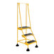 A yellow Vestil commercial rolling step ladder with black steps.