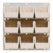 A Quantum white steel louvered panel with nine ivory bins.