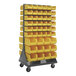 A Quantum gray steel mobile rack with yellow and white bins on louvered panels.