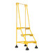 A yellow Vestil commercial rolling step ladder with three steps and two wheels.