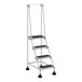 A white Vestil commercial rolling step ladder with four steps and serrated rubber steps.