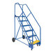 A blue steel rolling warehouse ladder with yellow handle and perforated steps.
