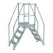 A Vestil galvanized steel crossover ladder with handrails and metal bars.