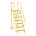 A yellow Vestil steel maintenance ladder with perforated steps.
