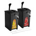 A couple of black ServSense plastic condiment pouch dispensers with red labels and black tubes.