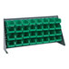 A Quantum gray bench rack with green bins on shelves.