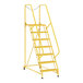 A yellow metal Vestil maintenance ladder with Grip Strut steps.