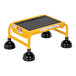 A yellow step platform with black wheels and a serrated rubber step.