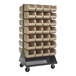 A Quantum mobile louvered rack with ivory bins on each side.