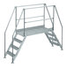A Vestil galvanized steel crossover ladder with metal steps and railings.