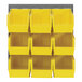 A Quantum gray steel louvered panel with yellow bins on a rack.