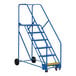 A blue steel rolling warehouse ladder with yellow handrails.