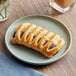 A Bridor blueberry cheesecake Danish pastry on a plate.