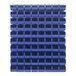A Quantum white louvered panel with blue plastic bins.