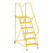 A yellow steel ladder with grip strut steps.