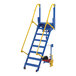 A blue and yellow Vestil electric folding mezzanine ladder with a yellow handle.