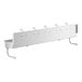 A white metal shelf with hooks for a rectangular white hand sink.
