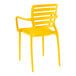 A Lancaster Table & Seating Sol sunshine yellow resin arm chair with a backrest and armrests.