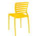 A yellow resin side chair with a backrest.