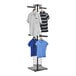 A black Grid & Go Slatgrid Tower Display with 4 Faceout Arms holding blue, white, and blue and white striped shirts.