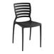 A black stone resin side chair with a slatted back.