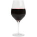 A Stolzle Bordeaux wine glass filled with red wine.