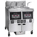 A black and grey Henny Penny electric fryer with Computron 1000 controls.