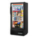 A True black narrow refrigerated glass door merchandiser full of food on shelves.