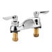 Two American Standard chrome deck-mount faucets with lever handles.