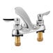 An American Standard deck-mount faucet with chrome and lever handles.