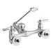 An American Standard chrome utility faucet with two knobs.