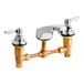 An American Standard deck-mount widespread lavatory faucet with two brass lever handles.