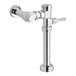 A chrome metal American Standard toilet flush valve with a handle.