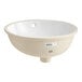 An American Standard Ovalyn white vitreous china undermount sink with a white bowl.