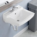 A close-up of a white American Standard Declyn wall-mount bathroom sink.