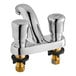 An American Standard deck-mount metering faucet with chrome handles.