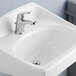 A white American Standard Colony Pro deck-mount lavatory sink with single lever control faucet.