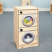 A wooden Whitney Brothers toddler washer and dryer set.