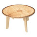 A Whitney Brothers round wooden table with a live edge top.