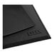A close up of a black Lavex anti-fatigue floor mat with beveled edges.